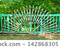 A bamboo object shaped like a fan 142868305