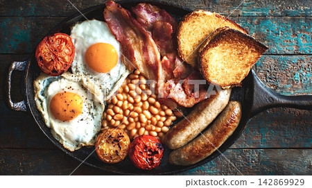 Full english breakfast served in cast iron skillet 142869929