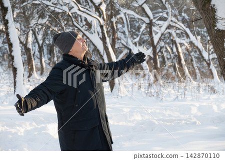 Senior man enjoying winter nature Senior man enjoying winter nature 142870110