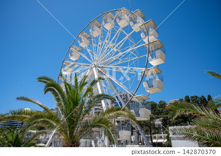 Budva Montenegro Ferris Wheel Against A Clear Blue Sky Budva Montenegro Ferris Wheel Against A Clear Blue Sky 142870370