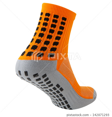 Orange and grey anti slip athletic sock with rubber grips on sole isolated on white background 142871293