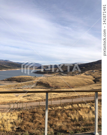 View of a mountain reservoir from a balcony in Utah, USA View of a mountain reservoir from a balcony in Utah, USA 142871491