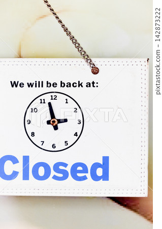 Closed sign with opening hours and message we will be back soon Closed sign with opening hours and message we will be back soon 142873222