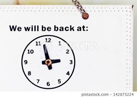 Closed sign with opening hours and message we will be back soon Closed sign with opening hours and message we will be back soon 142873224