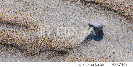 Close-up abstract of perfect wind ripple patterns in white sand dunes forming gentle waves Close-up abstract of perfect wind ripple patterns in white sand dunes forming gentle waves 142874051