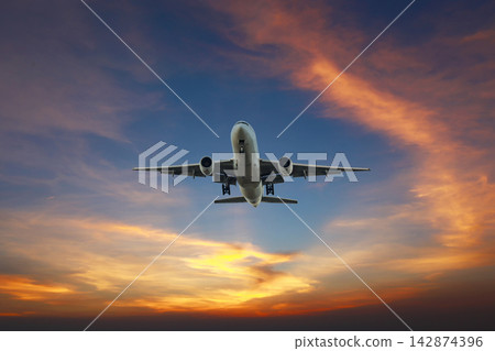 Airplane and sky, the plane is landing. Airplane take off on the blue sky Airplane and sky, the plane is landing. Airplane take off on the blue sky 142874396