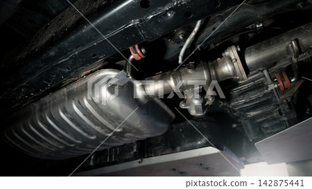 Car suspension and drive shaft. Structure of EV car spare parts. Such as Front or Rear suspension Shock absorber suspension Brake. Elements of the suspension and Chassis structure. Car service repair. Car suspension and drive shaft. Structure of EV car spare parts. Such as Front or Rear suspension Shock absorber suspension Brake. Elements of the suspension and Chassis structure. Car service repair. 142875441