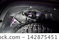 Car suspension and drive shaft. Structure of EV car spare parts. Such as Front or Rear suspension Shock absorber suspension Brake. Elements of the suspension and Chassis structure. Car service repair. 142875451