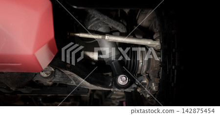 Car suspension and drive shaft. Structure of EV car spare parts. Such as Front or Rear suspension Shock absorber suspension Brake. Elements of the suspension and Chassis structure. Car service repair. Car suspension and drive shaft. Structure of EV car spare parts. Such as Front or Rear suspension Shock absorber suspension Brake. Elements of the suspension and Chassis structure. Car service repair. 142875454