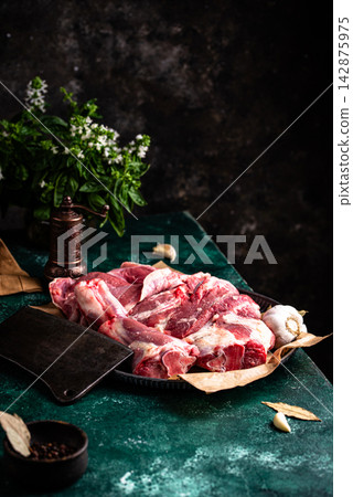 Raw leg of lamb, ready to cook 142875975