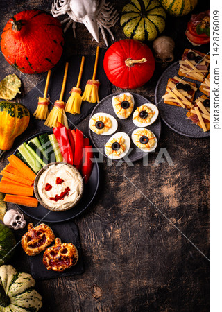 Halloween appetizers. Assortment of snack, food, party buffet Halloween appetizers. Assortment of snack, food, party buffet 142876009