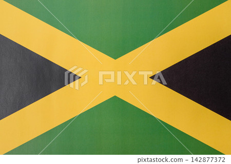 Jamaica flag as a symbol of national independence. The Jamaica flag Jamaica flag as a symbol of national independence. The Jamaica flag 142877372