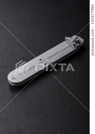 An oil tanker for maritime transport, energy resources and their movement. An oil tanker or carrier 142877460