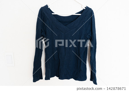 Front view photo of a navy ribbed top. Front view photo of a navy ribbed top. 142878671