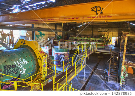 Abandoned Goldome Mill Interior With Graffiti and Mining Machinery in Mojave California Abandoned Goldome Mill Interior With Graffiti and Mining Machinery in Mojave California 142878985