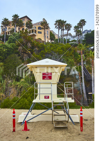 Lifeguard Stand on Sandy Beach with Palm Trees and Coastal Homes Laguna Beach Lifeguard Stand on Sandy Beach with Palm Trees and Coastal Homes Laguna Beach 142878999