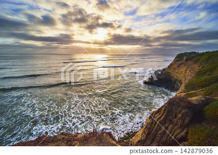 Sunset Cliffs Ocean View at Golden Hour with Dramatic Sky and Rugged California Coast Sunset Cliffs Ocean View at Golden Hour with Dramatic Sky and Rugged California Coast 142879036