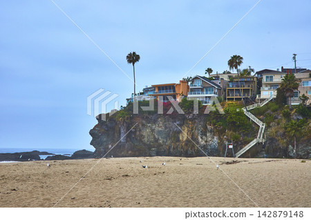 Cliffside Oceanfront Homes and Staircase Overlooking Sandy Laguna Beach Cliffside Oceanfront Homes and Staircase Overlooking Sandy Laguna Beach 142879148