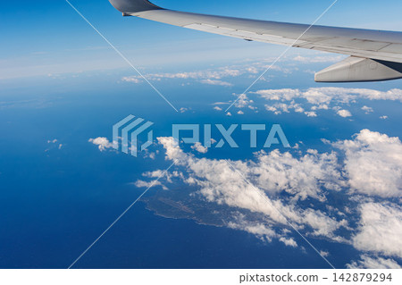 The Izu Islands as seen from outside the airplane window The Izu Islands as seen from outside the airplane window 142879294