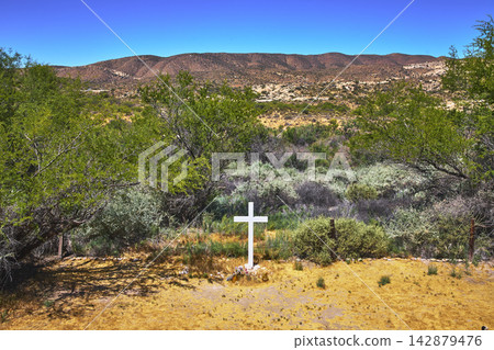 White Cross Grave Marker in Desert Landscape Near Jacumba Hot Springs California 142879476