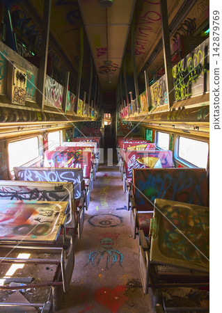 Abandoned California Train Car Interior Covered in Colorful Graffiti and Urban Decay Abandoned California Train Car Interior Covered in Colorful Graffiti and Urban Decay 142879769