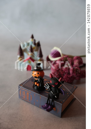 Flowers and decorations create a Halloween theme. Flowers and decorations create a Halloween theme. 142879859