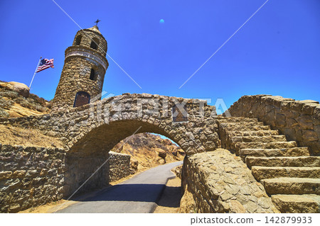 Mt Rubidoux Stone Tower and Bridge with American Flag in San Bernardino California Mt Rubidoux Stone Tower and Bridge with American Flag in San Bernardino California 142879933