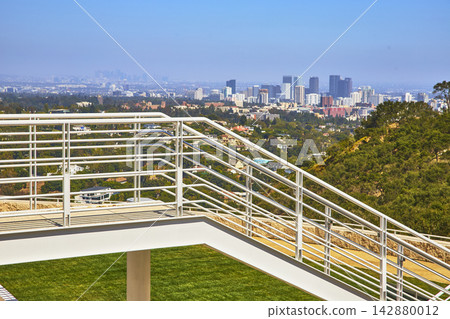 Getty Center Railings and Los Angeles Skyline with Green Hills in California Getty Center Railings and Los Angeles Skyline with Green Hills in California 142880012
