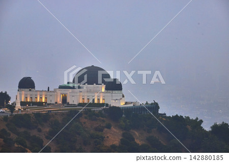 Griffith Observatory in Foggy Evening Light with Los Angeles Griffith Park Hills Griffith Observatory in Foggy Evening Light with Los Angeles Griffith Park Hills 142880185