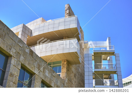 Modern Stone and White Metal Architecture at Getty Center under Blue Sky Modern Stone and White Metal Architecture at Getty Center under Blue Sky 142880201