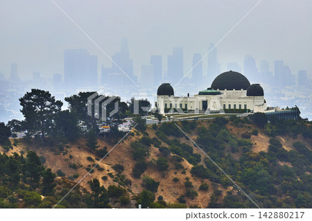 Griffith Observatory and Los Angeles Skyline with Fog over Griffith Park Griffith Observatory and Los Angeles Skyline with Fog over Griffith Park 142880217