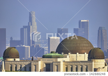 Griffith Observatory with Los Angeles Skyline and Skyscrapers in Griffith Park California Griffith Observatory with Los Angeles Skyline and Skyscrapers in Griffith Park California 142880248