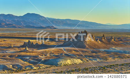 Aerial Trona Pinnacles California Desert Formations at Golden Hour Aerial Trona Pinnacles California Desert Formations at Golden Hour 142880371