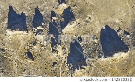 Aerial Trona Pinnacles Tufa Spires and Desert Shadows Top Down Aerial Trona Pinnacles Tufa Spires and Desert Shadows Top Down 142880388
