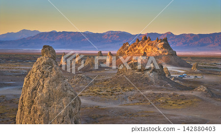Aerial Trona Pinnacles Desert Landscape with Mountains at Golden Hour California Aerial Trona Pinnacles Desert Landscape with Mountains at Golden Hour California 142880403