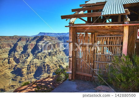 Grand Canyon West Abandoned Mine Structure and Desert Canyon Landscape Arizona Grand Canyon West Abandoned Mine Structure and Desert Canyon Landscape Arizona 142880500