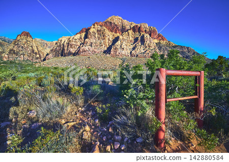 Red Rock Canyon Desert Landscape and Trail Signpost Near Las Vegas Nevada Red Rock Canyon Desert Landscape and Trail Signpost Near Las Vegas Nevada 142880584