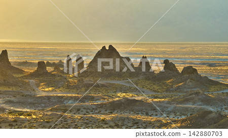 Aerial Trona Pinnacles at Golden Hour California Desert Landscape 142880703