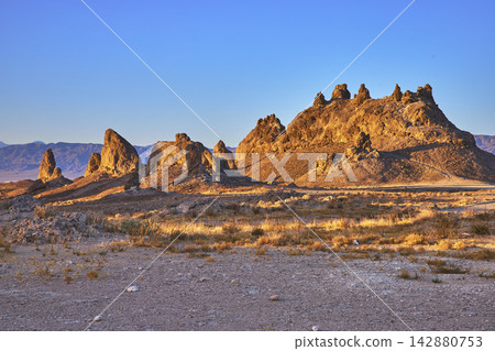 Trona Pinnacles Rock Formations at Golden Hour in California Desert Landscape Trona Pinnacles Rock Formations at Golden Hour in California Desert Landscape 142880753