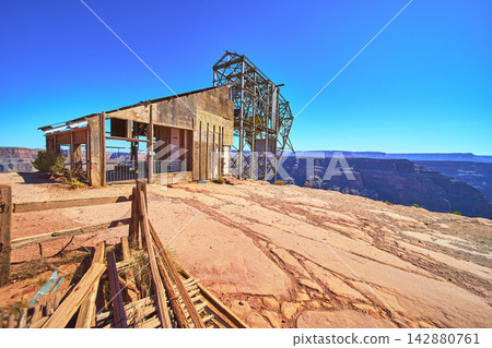 Abandoned Mine Structure on the Edge of Grand Canyon West Arizona Desert Landscape Abandoned Mine Structure on the Edge of Grand Canyon West Arizona Desert Landscape 142880761