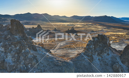 Aerial Trona Pinnacles Rugged Tufa Spires and Desert Landscape California 142880917