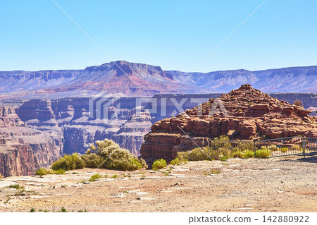 Grand Canyon West Rock Formation and Canyon Cliffs Under Clear Blue Sky Arizona Grand Canyon West Rock Formation and Canyon Cliffs Under Clear Blue Sky Arizona 142880922