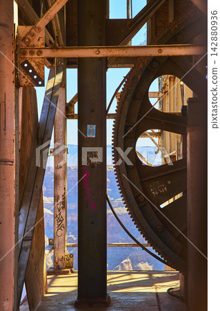 Grand Canyon West Abandoned Mine Machinery with Rusted Gears and Canyon View Grand Canyon West Abandoned Mine Machinery with Rusted Gears and Canyon View 142880936