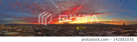 Aerial Downtown Las Vegas Nevada Cityscape at Sunset with Colorful Golden Hour Sky Aerial Downtown Las Vegas Nevada Cityscape at Sunset with Colorful Golden Hour Sky 142881038
