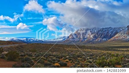Red Rock Canyon Snow Covered Mountains and Desert Panorama Nevada Red Rock Canyon Snow Covered Mountains and Desert Panorama Nevada 142881099