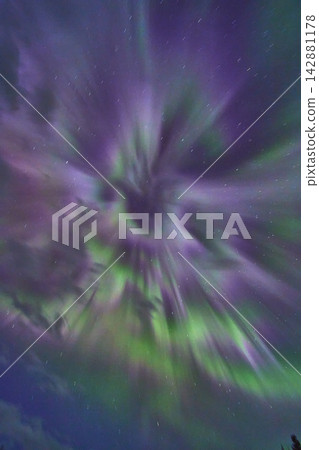 Northern Lights Aurora Borealis Green and Purple Night Sky Winter Northern Lights Aurora Borealis Green and Purple Night Sky Winter 142881178