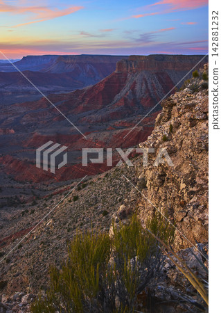 Grand Canyon Sunset View from Twin Point Overlook with Colorful Rock Layers Grand Canyon Sunset View from Twin Point Overlook with Colorful Rock Layers 142881232