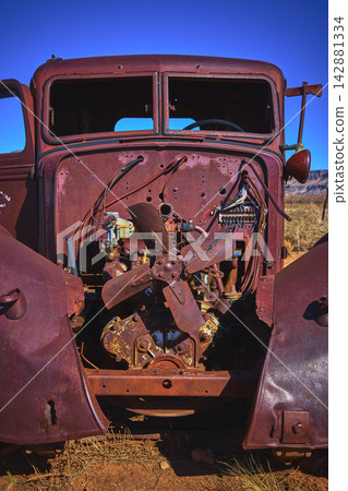 Abandoned Vintage Truck Engine Close Up in Arizona Desert Under Clear Blue Sky Abandoned Vintage Truck Engine Close Up in Arizona Desert Under Clear Blue Sky 142881334