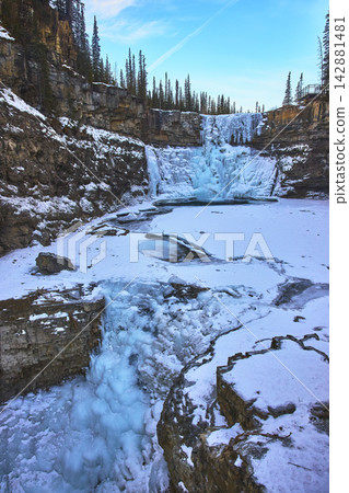 Frozen Waterfall and Snowy Canyon in Winter Wilderness Frozen Waterfall and Snowy Canyon in Winter Wilderness 142881481