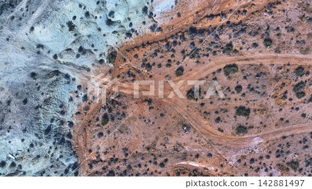 Aerial Forked Dirt Road and Colorful Desert Landscape Top Down Aerial Forked Dirt Road and Colorful Desert Landscape Top Down 142881497
